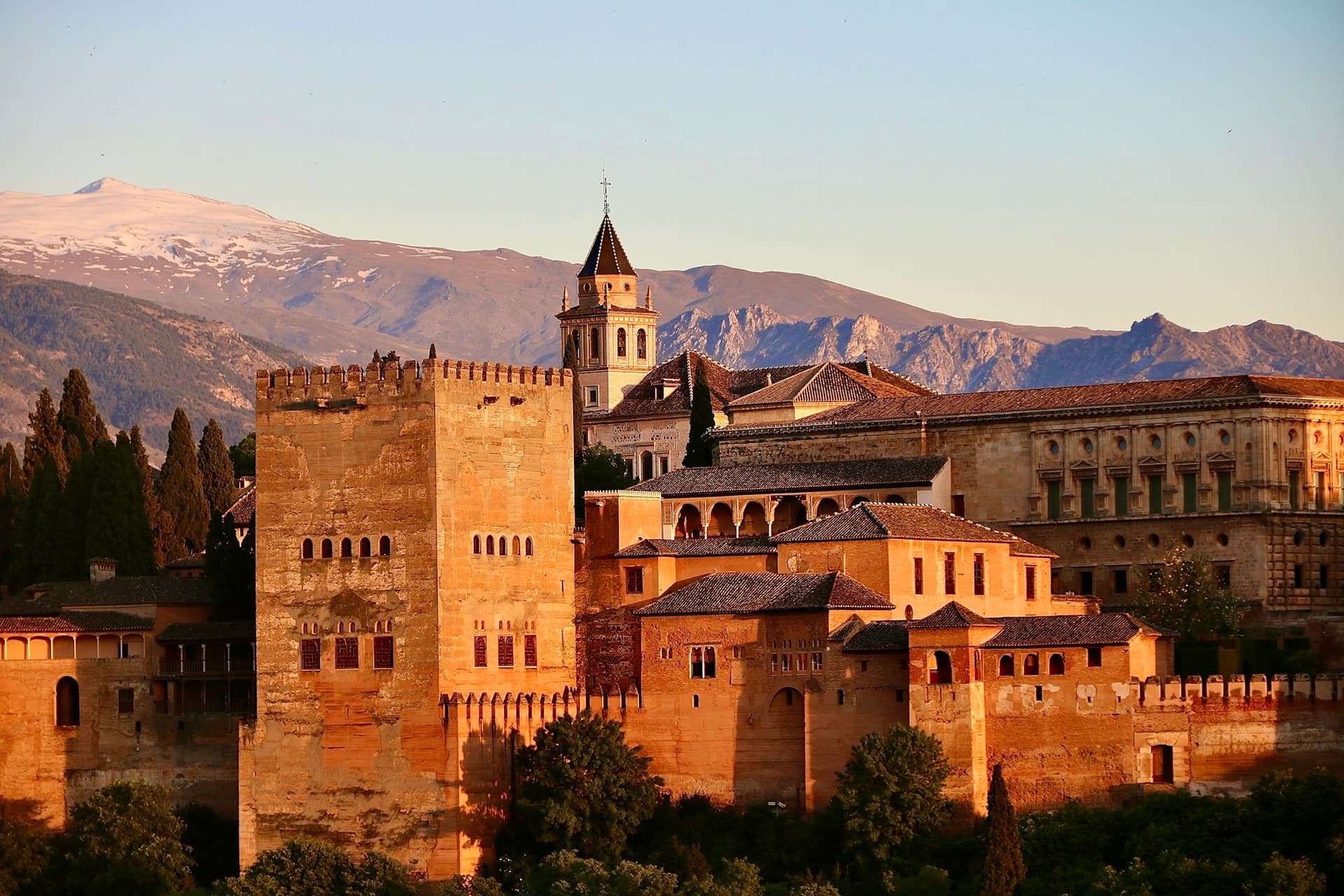 The Alhambra at sunset with snowy Sierra Nevada