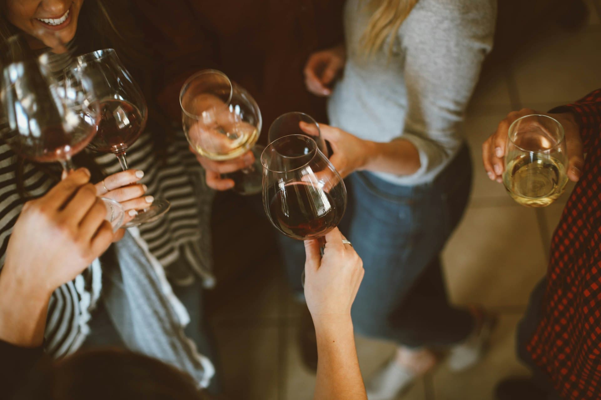 Friends toasting at night