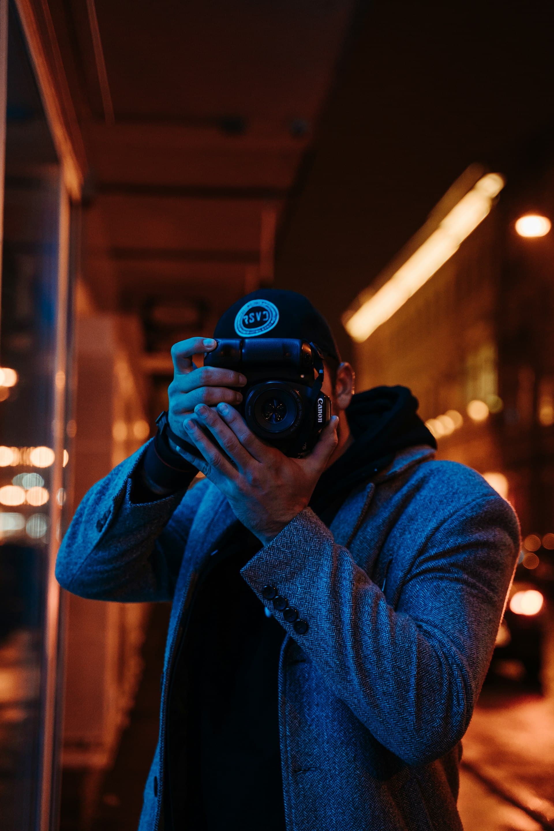 Someone taking photos at night